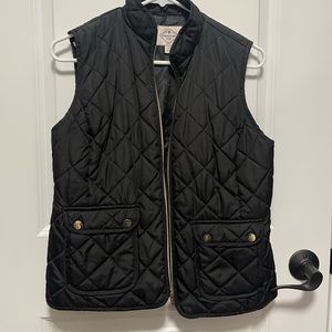 Puffer vest with gold accents